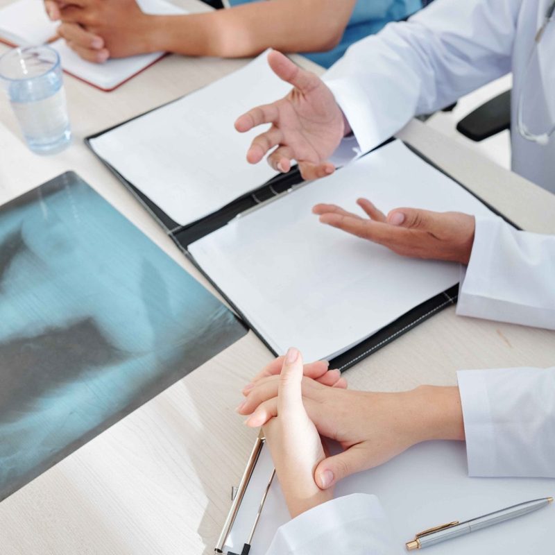 medical-specialists-discussing-disease